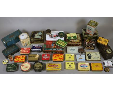 A large quantity of vintage advertising tins including Salmon & Glucksteins Gold Flake Cigarettes, Golden Virginia, Ogdens, O