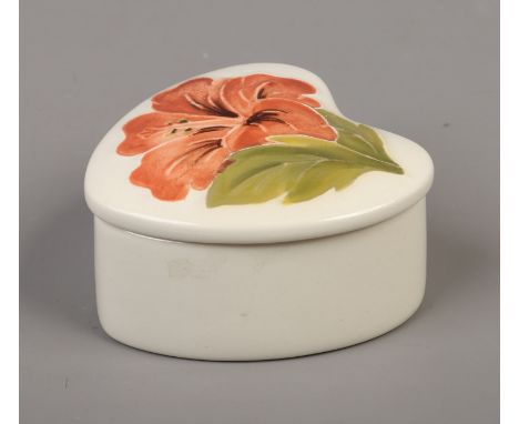 A heart shaped Moorcroft trinket dish and cover decorated in the hibiscus pattern impressed mark to the base.