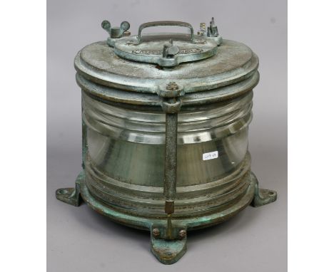 A heavy brass masthead ships lamp bearing manufacturers label William Harvie & Co. Ltd.