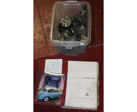 A quantity of motoring interest items; two Land Rover MK 3 locking tubs, vintage fuel pumps and a Lloyd 600 workshop manual.