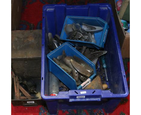 A box of vintage cobblers tools and other hand tools. Includes VAT on hammer.