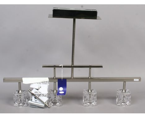 A new chrome and glass low voltage centre light with four clear glass dimple cube shades complete with accessories to alter l
