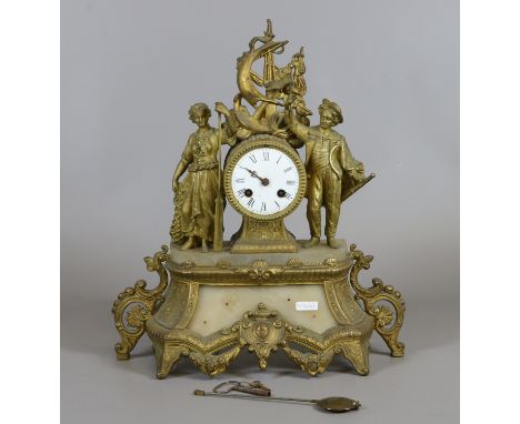 A C19th French gilt metal and alabaster mantel clock surmounted with figures and with enamel dial housing an eight day moveme