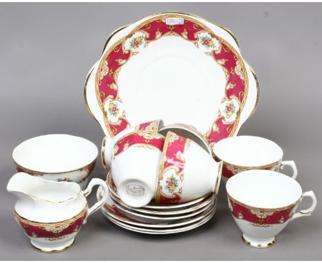 A Royal Tara china part tea service decorated in the Lady Hamilton pattern approximately 15 pieces.