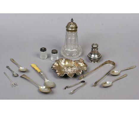 A small collection of mixed hallmarked silver including a glass sugar caster embossed pin tray, Georgian sugar tongues and as