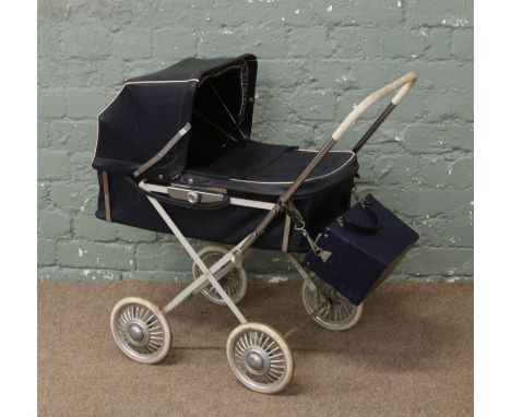 A childs vintage dolls pram.