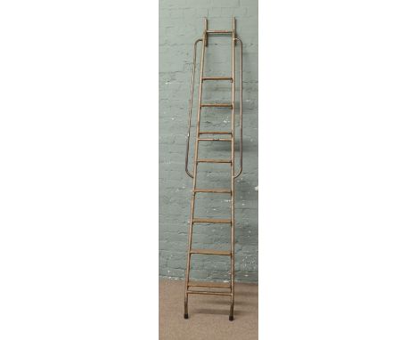 A vintage H. C . Slingsby warehouse ladder. Includes VAT on hammer.