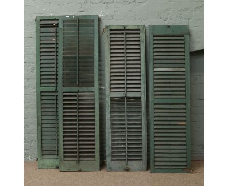 Two vintage painted louvre window shutters.
