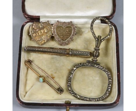 A 9ct gold Mizpah brooch, opal bar brooch, needle case and a quizzing glass.