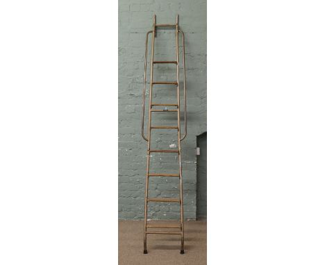 A vintage H. C . Slingsby warehouse ladder. Includes VAT on hammer.