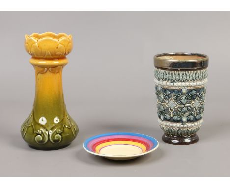 A Leeds Art Pottery small moulded vase, Newport pottery Clarice Cliff Bizarre saucer and a Doulton Lambeth beaker by Kate Dav