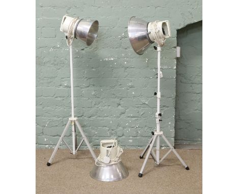 Three Photax Photography lamps, two on tripod bases. Includes VAT on hammer.