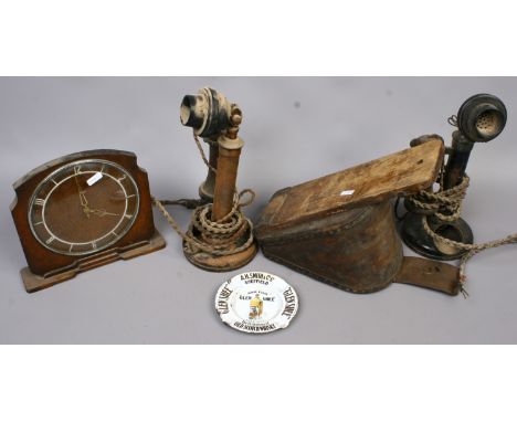 Two antique stick telephones, pair of bellows, 30 hour oak mantel clock and a Glen Shee enamelled advertising ash tray.