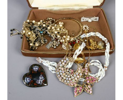 A box of mixed vintage costume jewellery including stone set brooches and drop earrings etc.