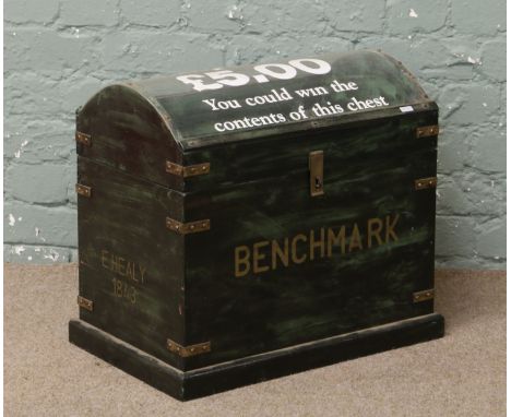 A brass bound and painted dome top trunk with perspex top formally for raffle prizes.