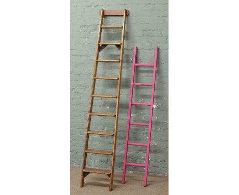 A vintage Bardsleys warehouse ladder and a painted six rung ladder. Includes VAT on hammer.