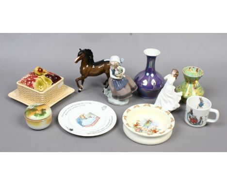 A group of collectable ceramics including a Lladro figure of a young girl, Carlton ware, Beswick model of a horse, Royal Doul