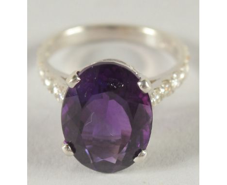 A GOOD 18CT WHITE GOLD AMETHYST AND DIAMOND RING.