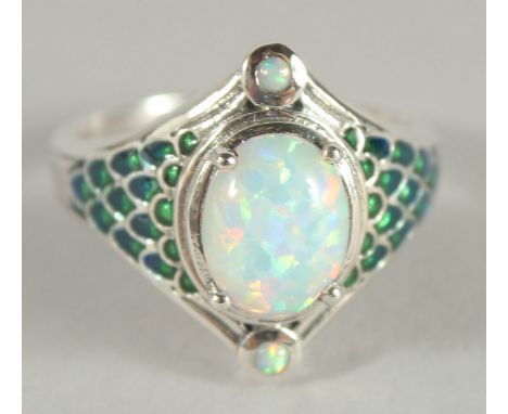 A SILVER OPAL AND ENAMEL RING.