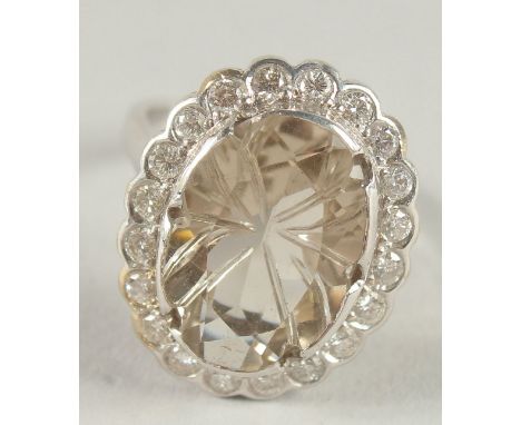 A SUPERB 18CT WHITE GOLD CITRINE AND DIAMOND CLUSTER RING.