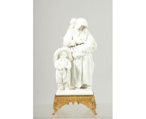 A GOOD VINCENNES SEVRES WHITE PORCELAIN GROUP of a mother, baby and child by her side, on a square ormolu base.