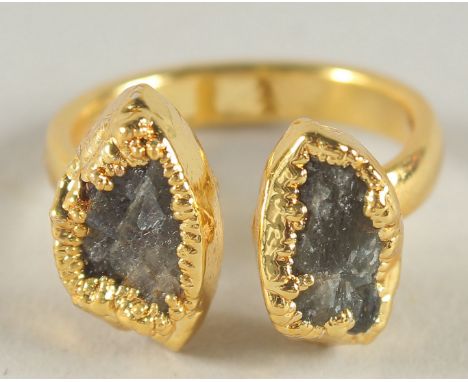 A MODERISTC SEFA HUYUK RING.