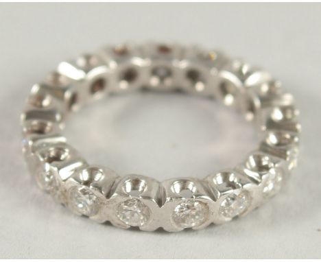 A GOOD 18CT WHITE GOLD DIAMOND FULL ETERNITY RING.