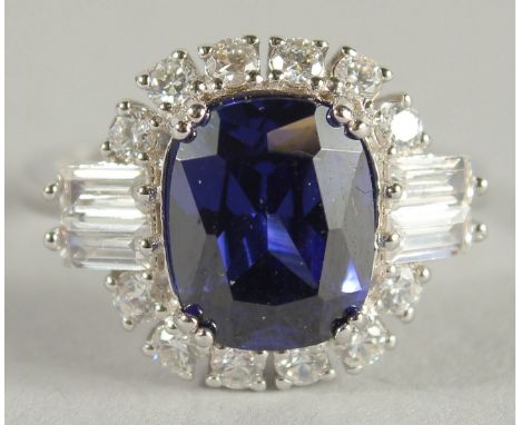 A SILVER SAPPHIRE C Z RING.