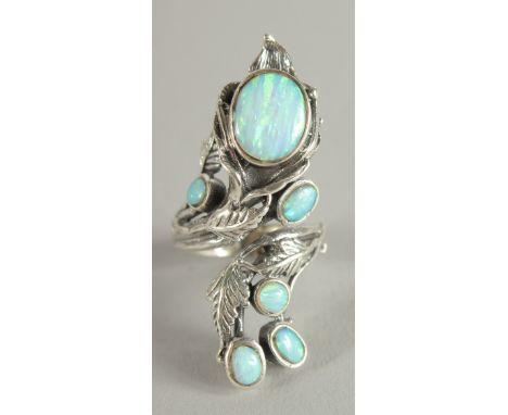 A SILVER REAL OPAL NATURALISTIC RING.