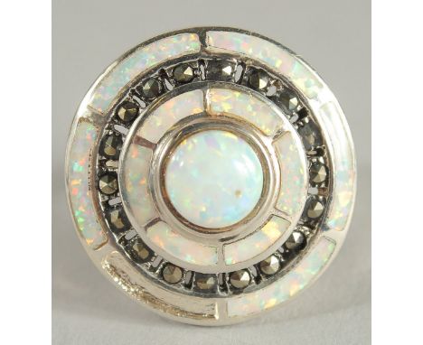 A SILVER OPAL AND MARCASITE DECO STYLE TARGET RING.