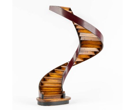 An architectural model of a revolving staircase, wood.The first half of the 20th century.&nbsp;Dimensions: (H:47,5 x D:29 cm)