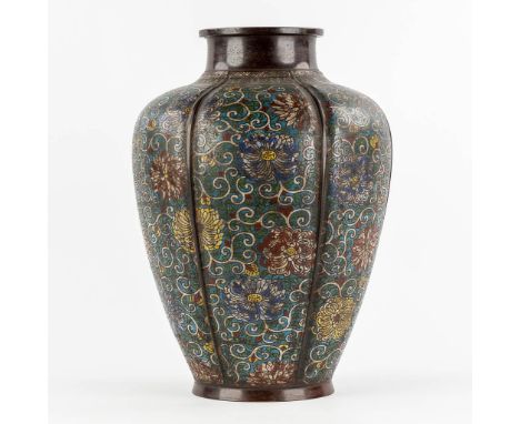 A large and Oriental vase, bronze met een Champsleve decor.Dimensions: (H:45 x D:32 cm)