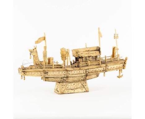 An antique Chinese model of a ship, sculptured bone. Circa 1900.Dimensions: (L:13 x W:50 x H:28 cm)