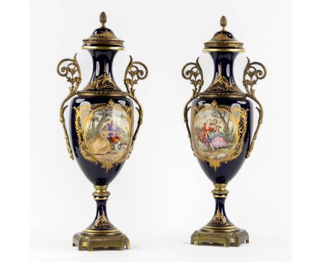 Sèvres, a pair of bronze mounted hand-painted vases, signed Garnier.&nbsp;Circa 1900.&nbsp;Condition report: - One lid restor
