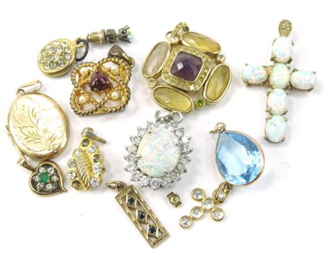 Various pendants, to include a 9ct gold oval pendant partially engine turned, 3½ grams, various others. (a quantity)