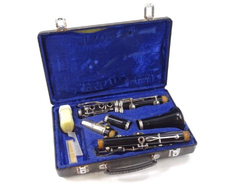 A Boosey and Hawkes cased clarinet, in fitted case, 35cm wide.