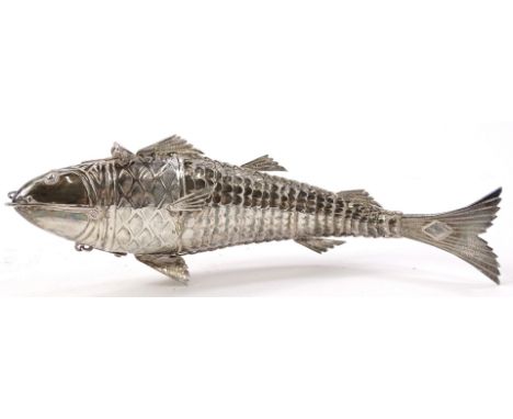 A 20thC Continental articulated fish snuff box, with hinged lid, articulated scale body and textured tail, unmarked white and