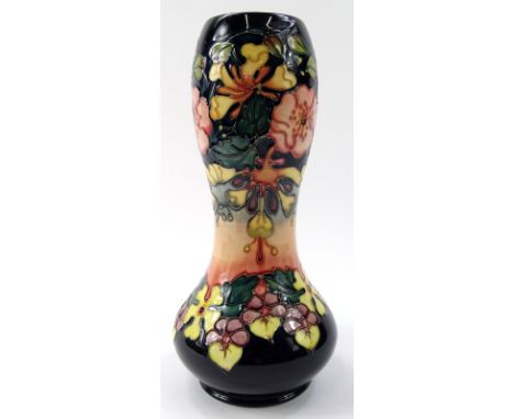 A Moorcroft pottery Oberon pattern vase, of inverted outline on circular foot, impressed and painted marks beneath, 28cm high