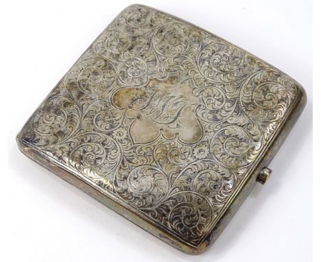 A George V silver cigarette case, of rounded outline, engine turned with initial cartouche and plain interior, Chester 1922, 
