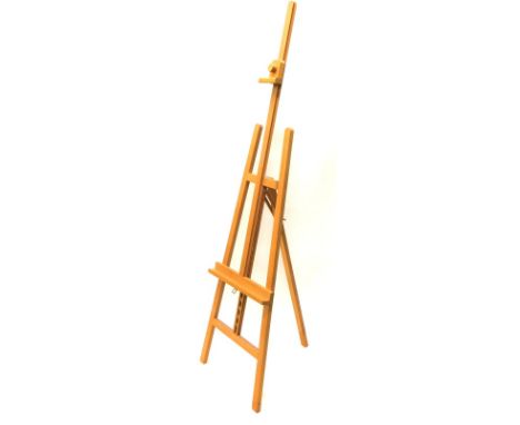 An adjustable beech artist easel.