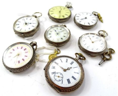 A selection of Victorian and later silver fob watches, most with ceramic dials and Roman numerals, and engine turned cases. (
