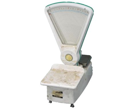 A set of white enamel heavy duty shop scales.