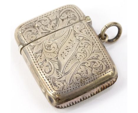 An early 20thC silver vesta case, of rounded engine turned outline with hooked side, 5cm high, marks rubbed, ½oz.