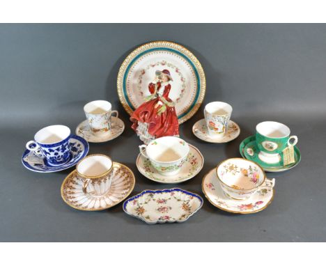 A Royal Doulton Figure 'Top Of The Hill' HN4834 together with various cups and saucers and dishes 