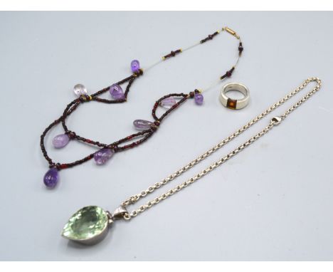 A Silver Amber Set Ring together with a Silver Necklace with Pendant and a Garnet and Amethyst Fringe Necklace 