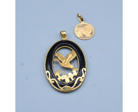 A 14ct. Gold and Enamel Decorated Oval Pendant, 3.2gms, together with a 9ct. gold small pendant, 0.6gms 