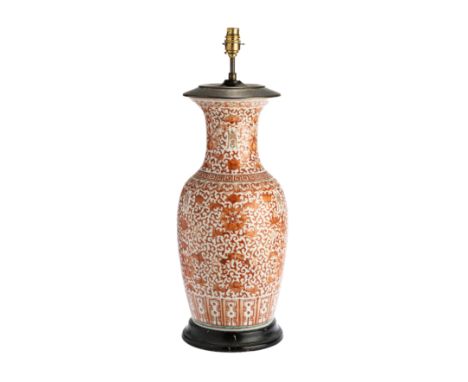 A CHINESE IRON-RED BALUSTER VASE MOUNTED AS A LAMP, LATE QING DYNASTY, painted around the exterior with gilt Shou characters 