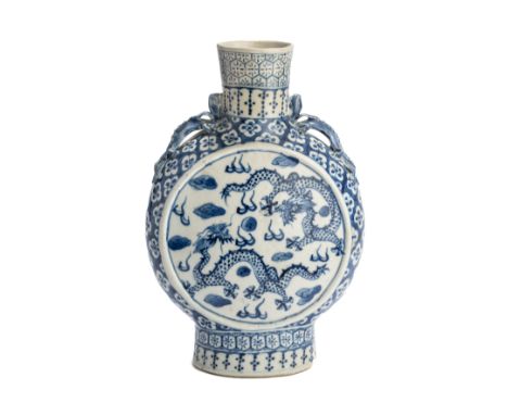 A CHINESE MOONFLASK, LATE 19TH / EARLY 20TH CENTURY, typical form, each side painted with a roundel of a pair of dragons chas