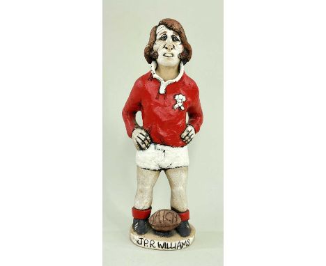 ‡ JOHN HUGHES: GROGG - ceramic standing caricature of Welsh Rugby Union player J.P.R Williams, in typical stance with hands o