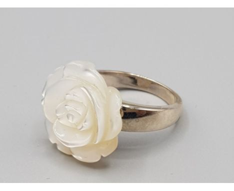 Silver carved mother of pearl flower ring , size R